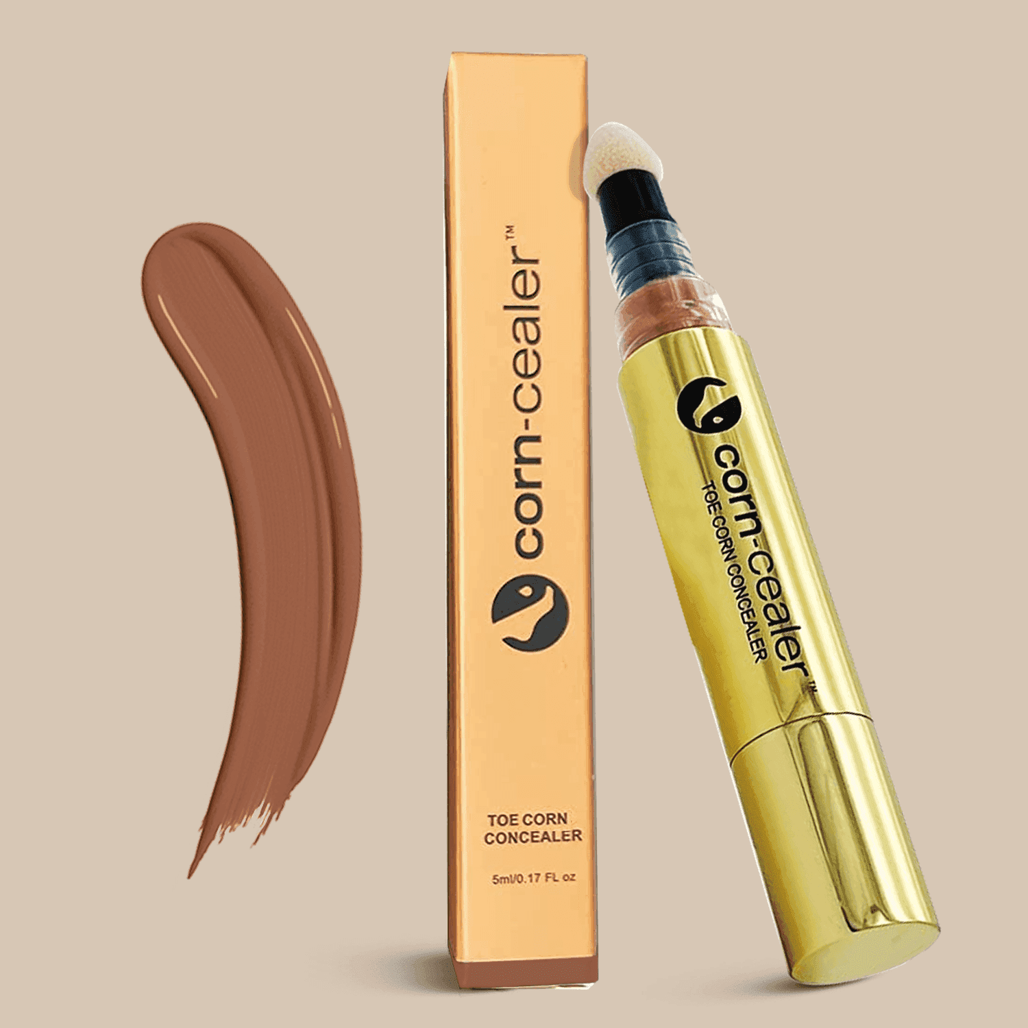 Toe Corn Concealer in Nutmeg shade with applicator and packaging. Instantly covers toe corns with flawless, water-resistant coverage for open-toed shoes.